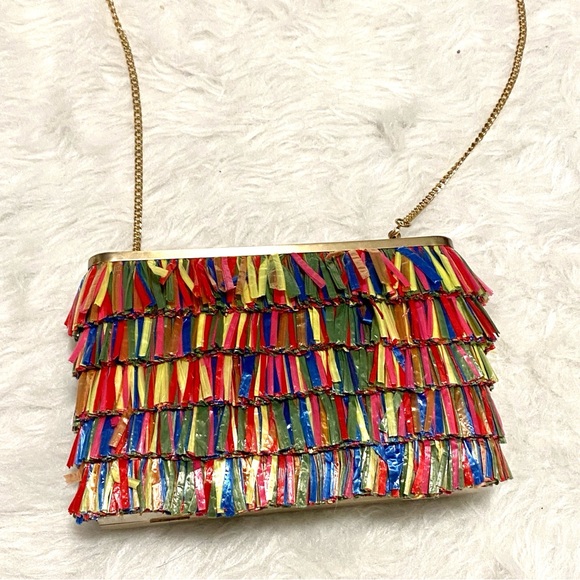 Olga Berg Carlita Carnivale multi-color raffia fringe clutch gold-tone chain.